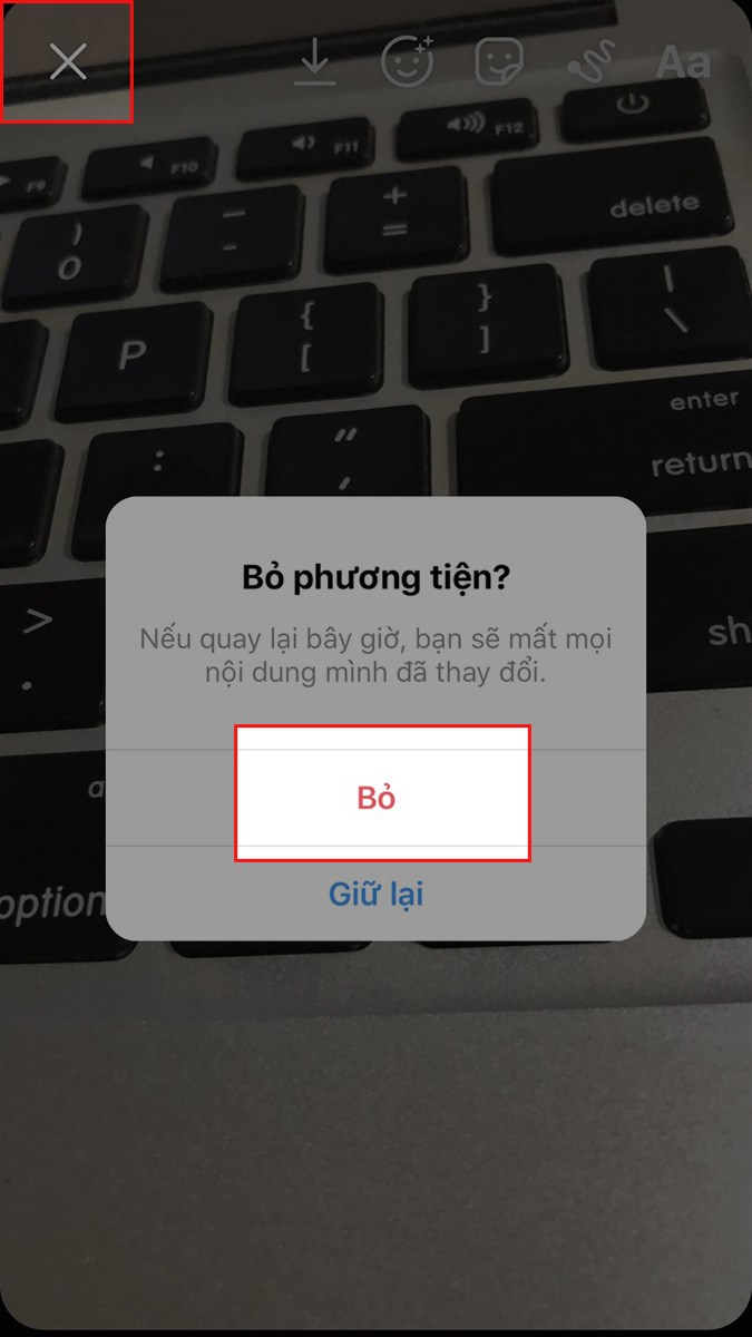 Nhấn vào biểu tượng dấu X ở góc trên bên trái > Nhấn Bỏ để xoá ảnh vừa chụp Nhấn vào biểu tượng dấu X ở góc trên bên trái > Nhấn Bỏ để xoá ảnh vừa chụp