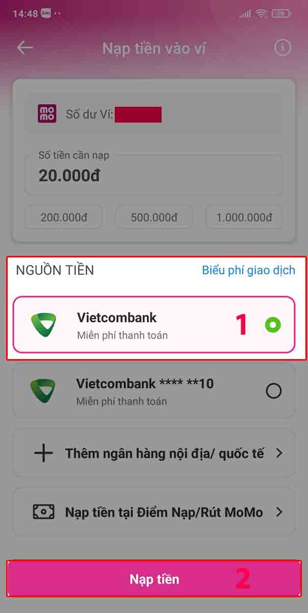 Bạn chọn ngân hàng Vietcombank tại mục Nguồn tiền. Sau đó nhấn Nạp tiền. Chọn ngân hàng Vietcombank. Sau đó nhấn Nạp tiền.