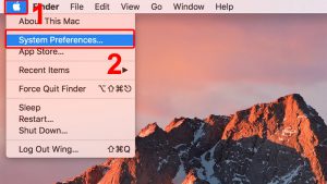 Vào biểu tượng Apple và chọn System Preferences