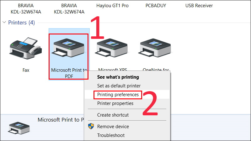 Nhấn chuột phải vào máy in bị lỗi, chọn Printing Preferences
